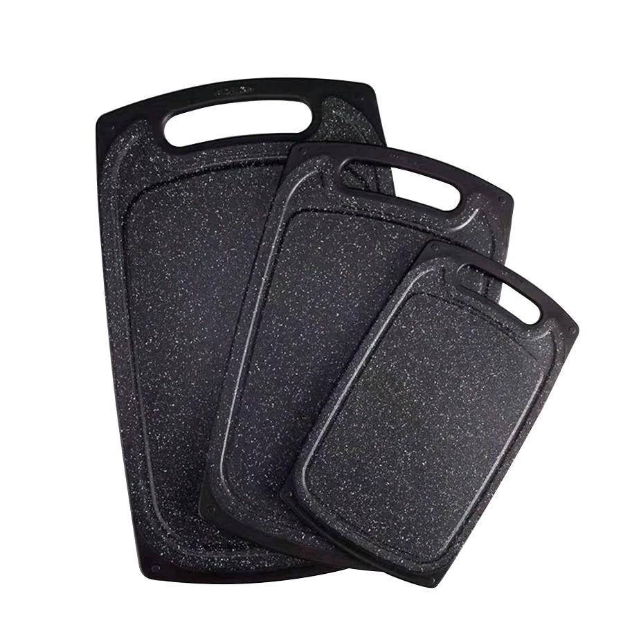 Planches à découper Duralite Premium en composite antibactérien, montrant les trois grandeurs du trio en éventail sur un fond blanc