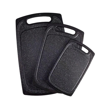 Planches à découper Duralite Premium en composite antibactérien, montrant les trois grandeurs du trio en éventail sur un fond blanc