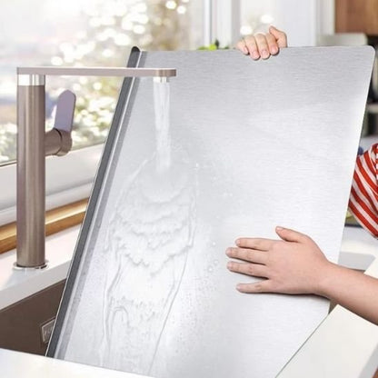 Planche à découper en inox facile à nettoyer sous robinet